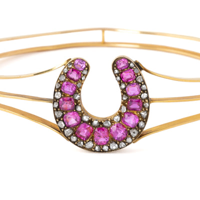 VINTAGE 18K YELLOW GOLD DIAMOND AND RUBY HORSESHOE BANGLE