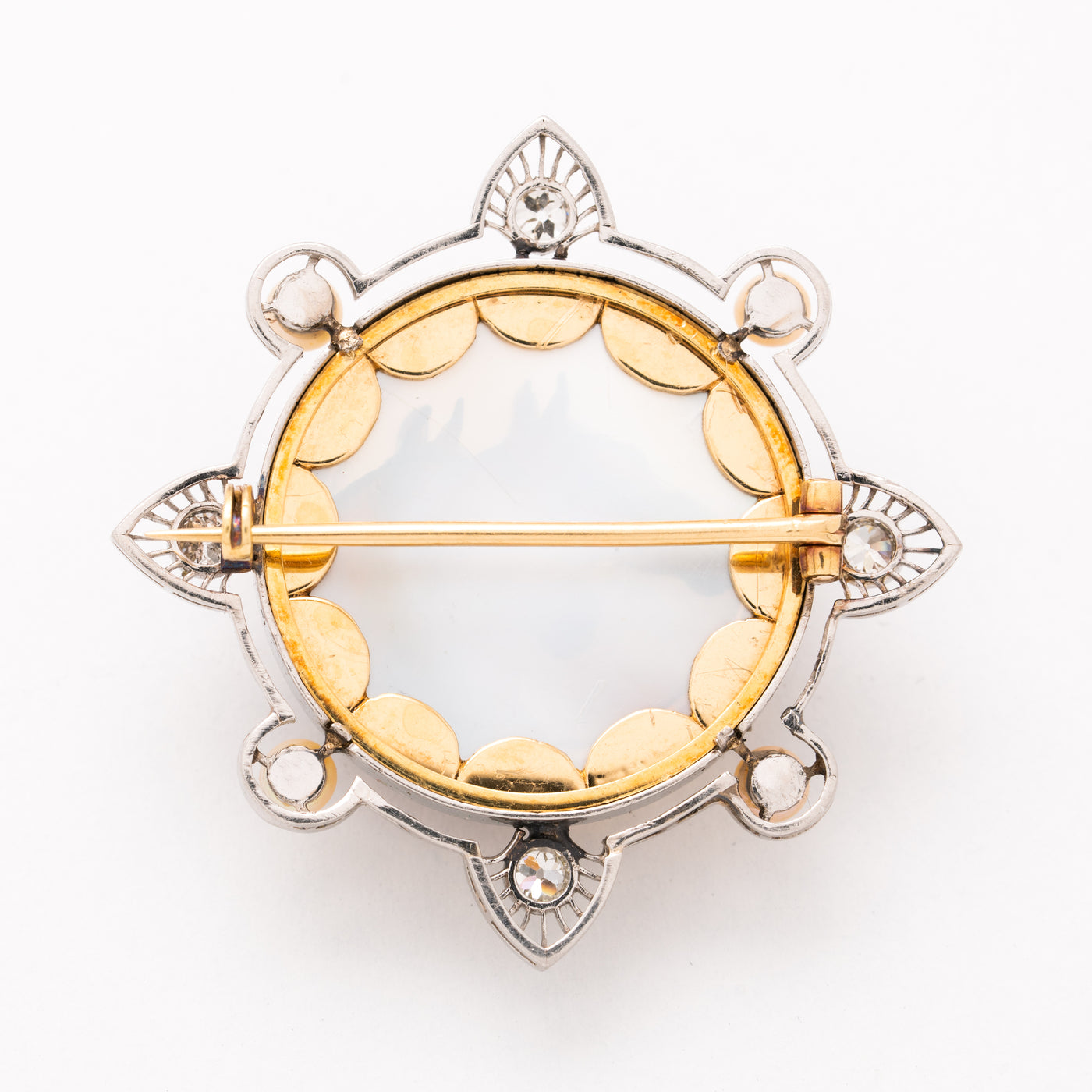 EDWARDIAN PLATINUM, DIAMOND AND PEARL REVERSED CARVED EQUESTRIAN BROOCH c.1910