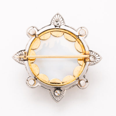 EDWARDIAN PLATINUM, DIAMOND AND PEARL REVERSED CARVED EQUESTRIAN BROOCH c.1910