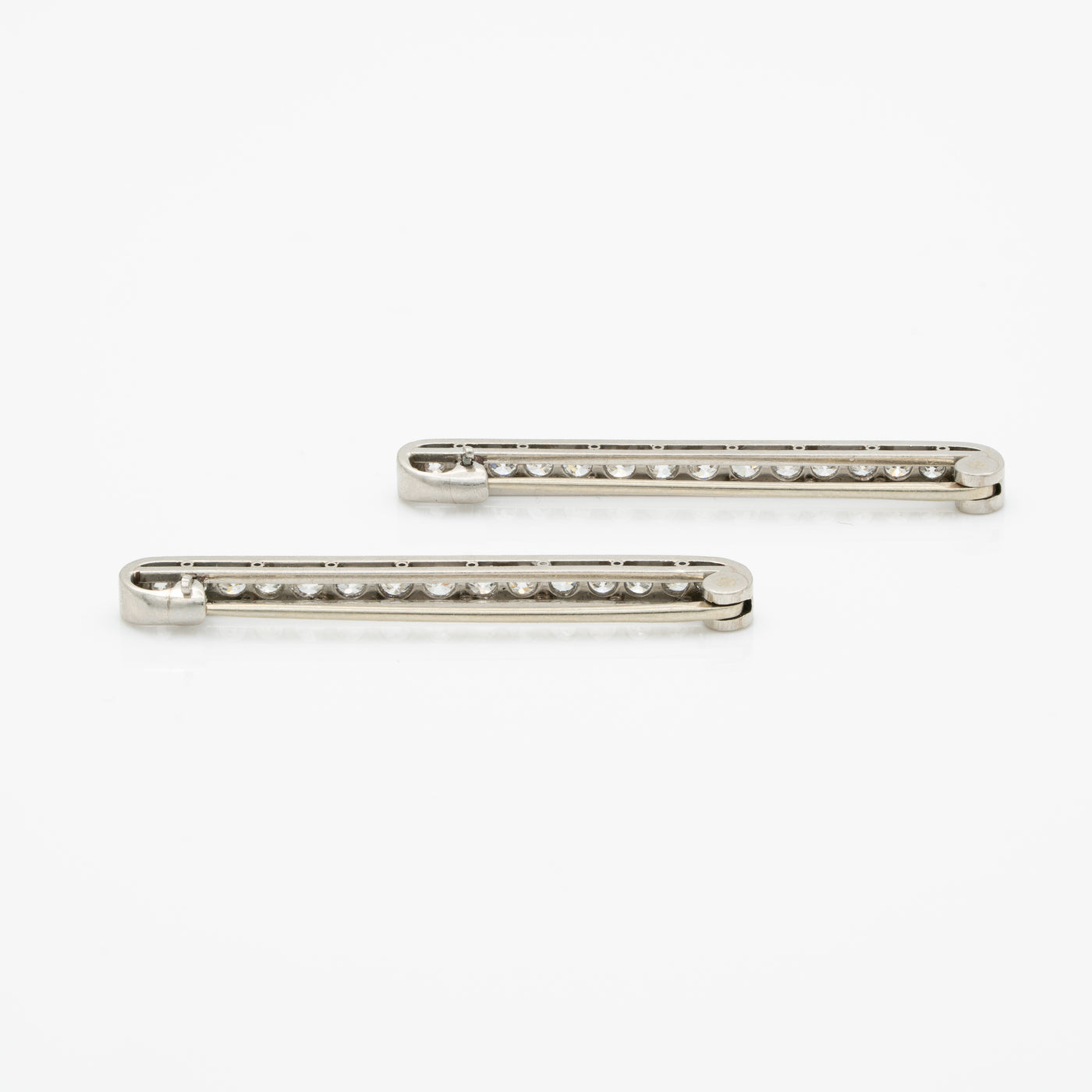 ART DECO PLATINUM AND DIAMOND MATCHING PAIR BAR BROOCHES c.1925