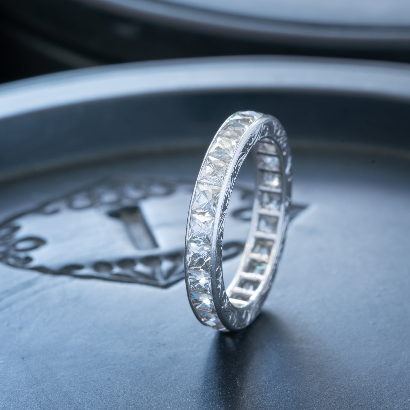 HAND ENGRAVED PLATINUM AND 4.0CTS. FRENCH CUT DIAMOND ETERNITY RING