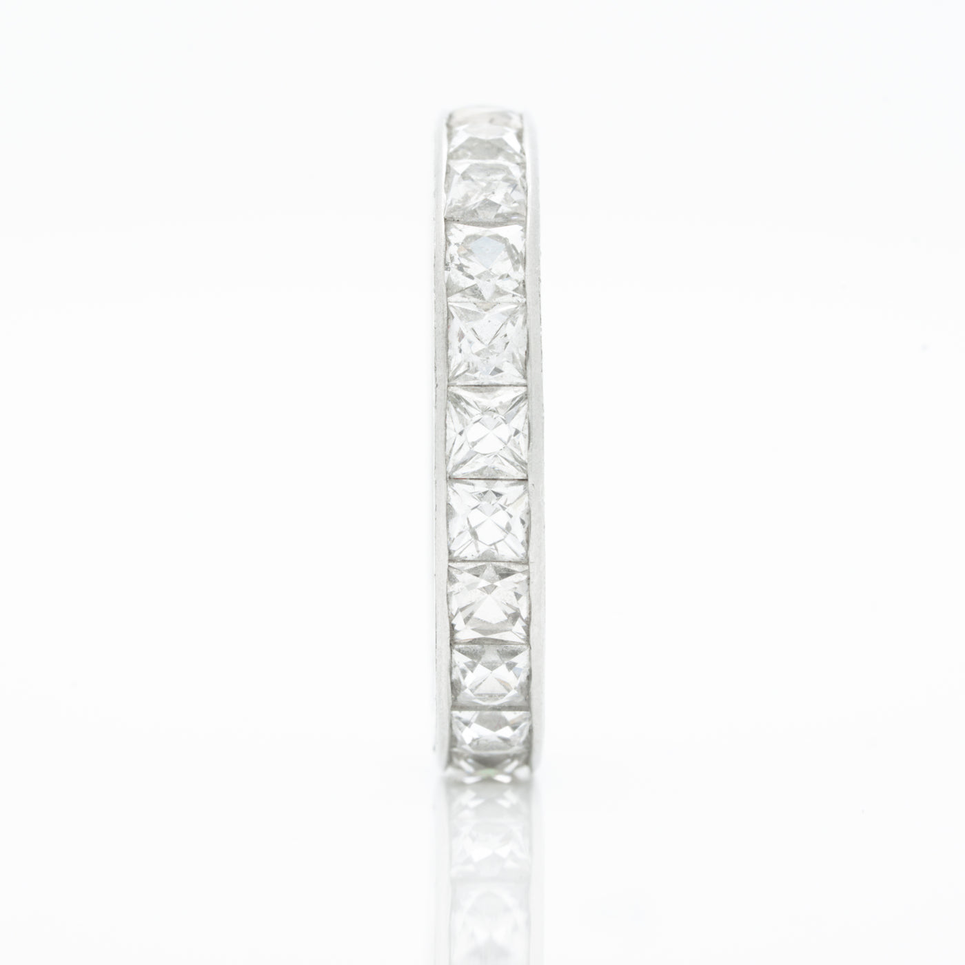 HAND ENGRAVED PLATINUM AND 4.0CTS. FRENCH CUT DIAMOND ETERNITY RING