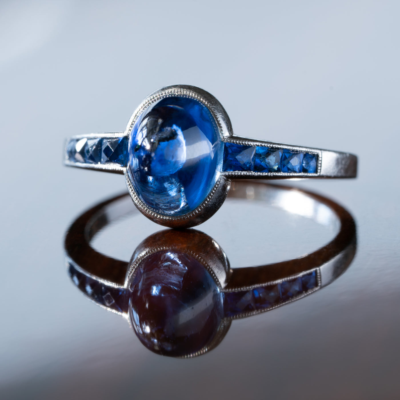 ART DECO FRENCH PLATINUM AND 1.30CT. CABOCHON SUGARLOAF SAPPHIRE RING c.1920s