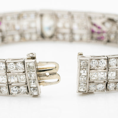 ART DECO PLATINUM OLD EUROPEAN CUT AND CARRE CUT DIAMOND AND COLOMBIAN EMERALD, ONYX AND RUBY c.1920s