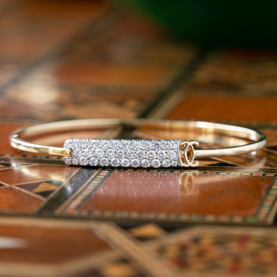 CARTIER 18K YELLOW GOLD 1.20CTS. DIAMOND BANGLE c.1980s